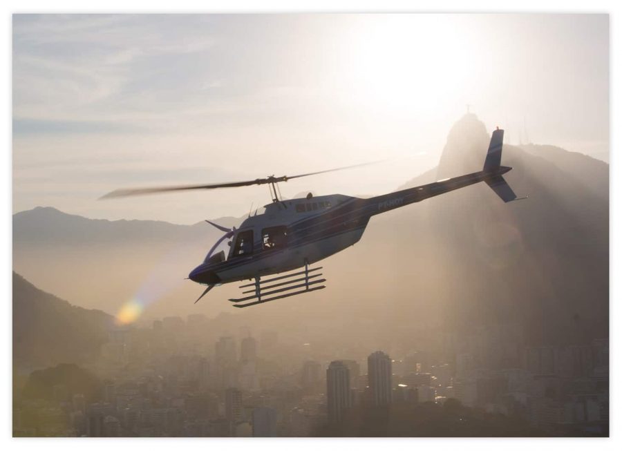 Helikopter im Sonnenuntergang Poster Querformat